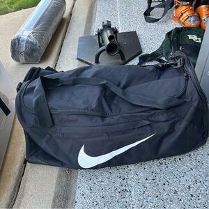 Nike duffel bag black with white swoosh